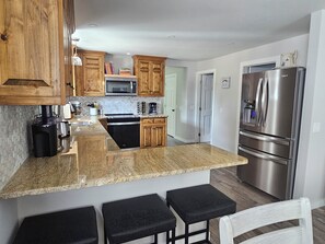 Fridge, microwave, oven, stovetop - Modern Comfort in Downtown Victor  (Victor)