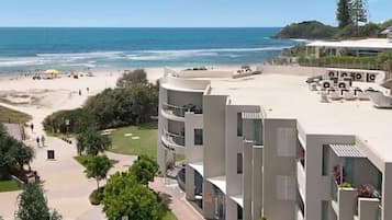 On the beach, beach towels