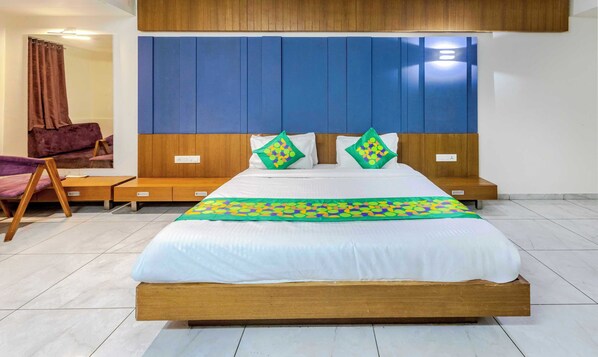 Deluxe Room | Blackout drapes, rollaway beds, bed sheets - Treebo Blue Moon (Gandhinagar)
