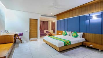 Deluxe Room | Blackout curtains, rollaway beds, bed sheets
