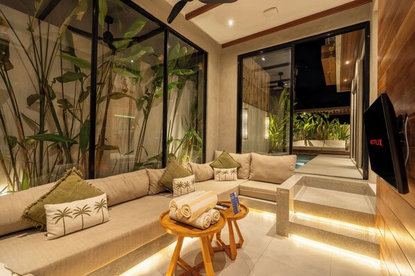 Villa, 2 Bedrooms | Living room | 35-inch flat-screen TV with cable channels