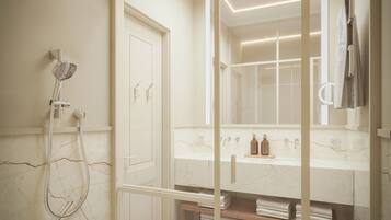 A modern bathroom with a shower, vanity, and towel rack.