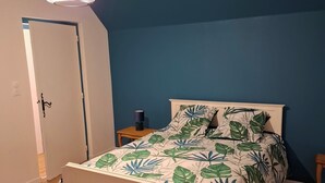 1 bedroom, desk, iron/ironing board, travel crib
