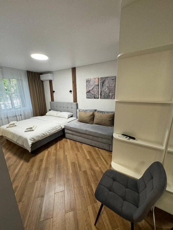 Eenvoudig appartement | 1 slaapkamer, een strijkplank/strijkijzer, gratis wifi, beddengoed
