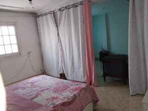 Economy Single Room, Balcony, City View | Iron/ironing board, free WiFi - Cairo center guest House female only (Cairo)