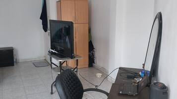 Economy Single Room, Balcony, City View | Iron/ironing board, free WiFi