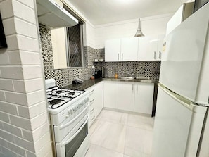 Fridge, microwave, oven, stovetop - Central Subiaco Oasis 1 Bedroom Unit (Subiaco)