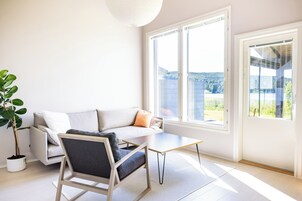 Design Condo, 3 Bedrooms, Lake View | Living area | Flat-screen TV