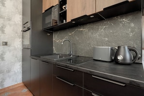 Apartment, 1 Bedroom, Balcony | Private kitchenette | Microwave, dining tables - Apartment With AC by Renters (Wroclaw)