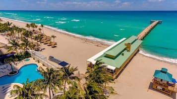 On the beach, sun loungers, beach towels