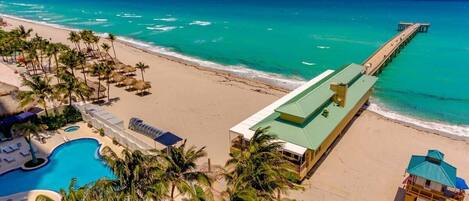 On the beach, sun-loungers, beach towels