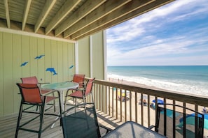 Outdoor dining - Dolphin Watch - Enjoy ocean views from your private balcony/porch. (Surf City)