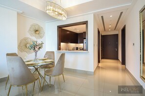 Deluxe Apartment, Balcony, City View | Living area - WelHome - Luxury Apt in Downtown with Burj Khalifa & Fountain View (Dubai)