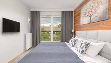 1 slaapkamer, een strijkplank/strijkijzer, wifi, beddengoed