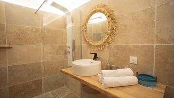 Shower, hair dryer, towels, soap