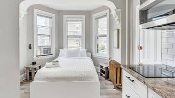 Apartment, 1 Bedroom | 1 bedroom, desk, laptop workspace, iron/ironing board