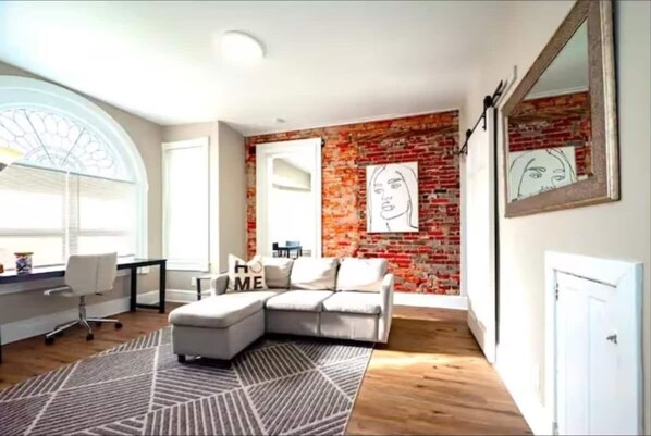 Apartment, 1 Bedroom | Living area - Gilpin Grand - Renovated Space In Trolley Square 1 Bedroom Apts by RedAwning (Wilmington)