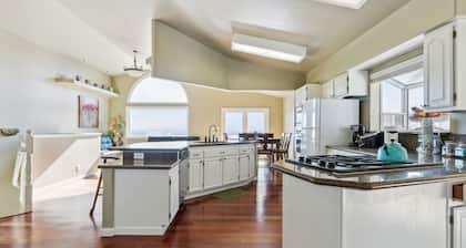 Elegant Escape 4 Bedroom Home by RedAwning