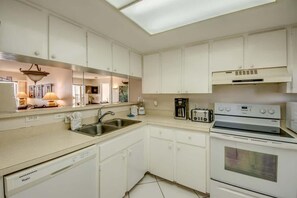 Fridge, microwave, oven, stovetop - Windward Point #309 - Direct Bayfront Views (Fort Myers Beach)