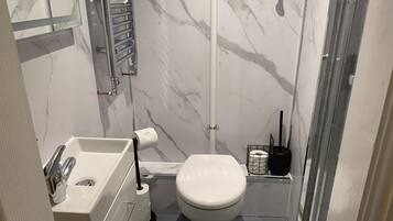 Shower, towels, soap, shampoo