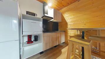 Fridge, microwave, coffee/tea maker, cookware/dishes/utensils