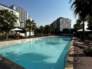 Pool - Charming Studio Apartment in Afnan 4, IMPZ by Deluxe Holiday Homes (Dubai)