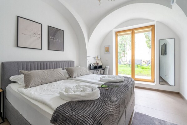 1 bedroom, desk, iron/ironing board, travel crib