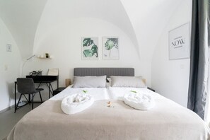 1 bedroom, desk, iron/ironing board, travel crib
