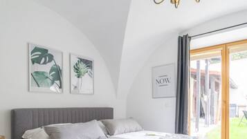 1 bedroom, desk, iron/ironing board, travel crib