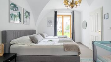 1 bedroom, desk, iron/ironing board, travel crib