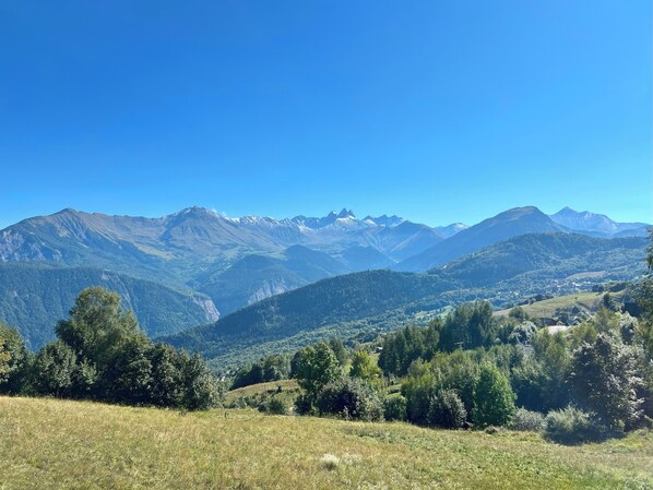 A mountainous landscape with a clear sky.