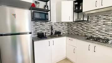 Fridge, microwave, coffee/tea maker, toaster