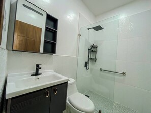 Shower, hair dryer, towels, soap