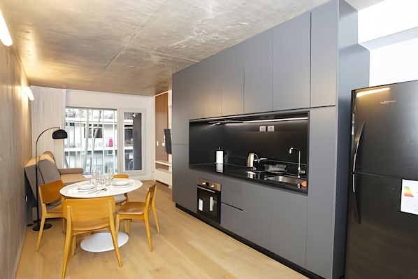 Mini-fridge, microwave, stovetop, toaster