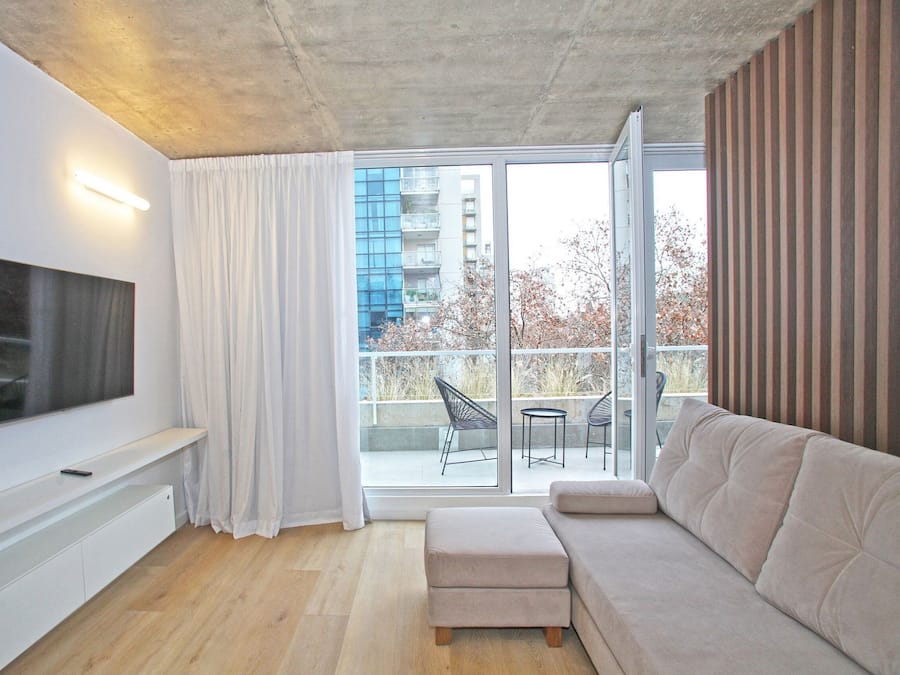 Apartamento luxo | Área de estar | TV LED 45 polegadas com canais a cabo