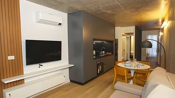 Family Apartment | Living area | 45-inch LED TV with cable channels