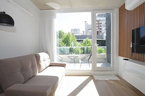 Appartement Familial | Coin séjour | Télévision LED de 45 pouces avec chaînes par câble