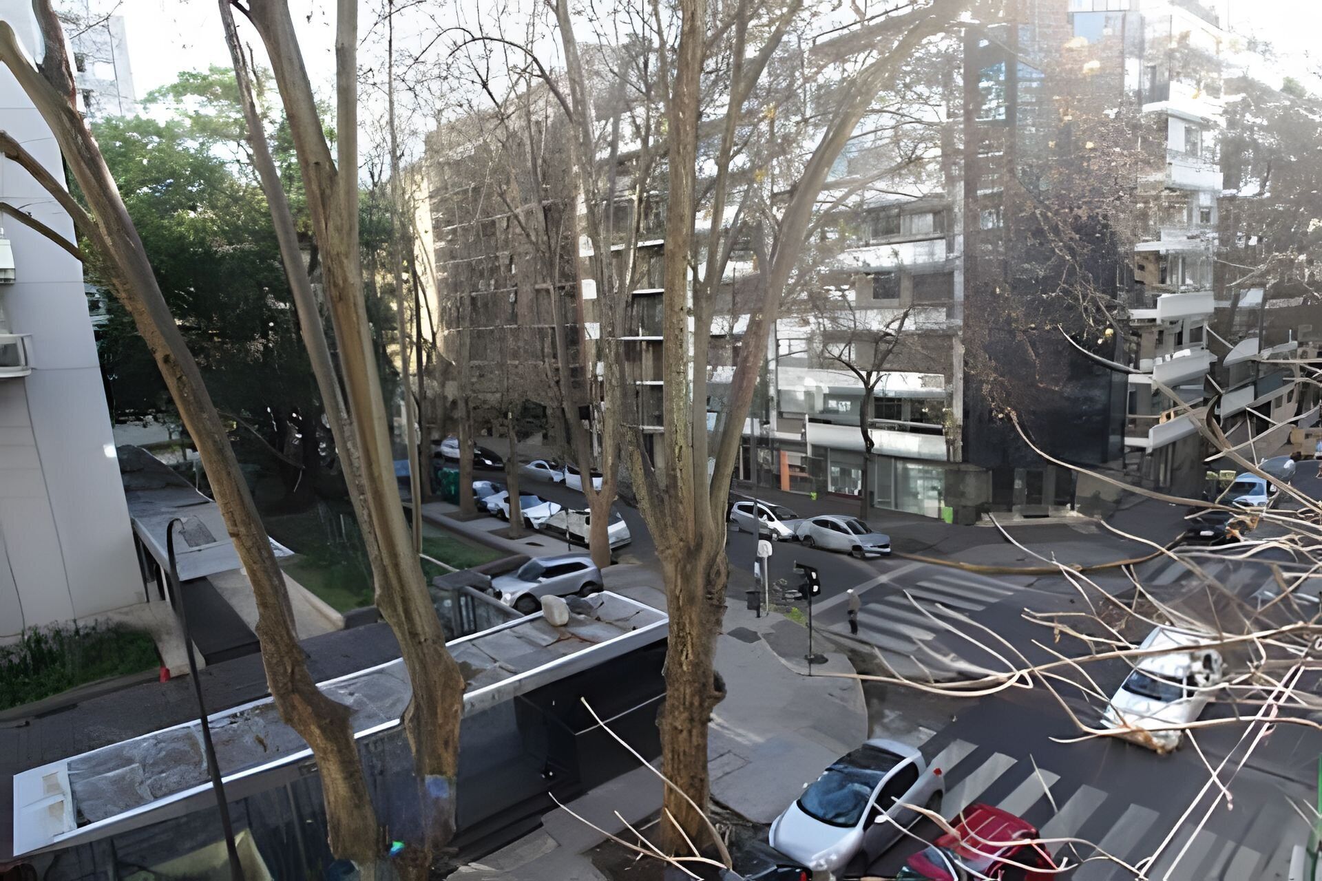 A multi-story parking garage with cars parked on multiple levels.