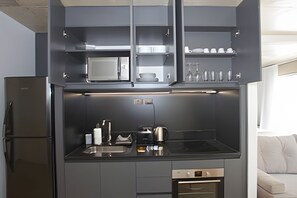 Appartement Deluxe | Cuisine privée | Mini réfrigérateur, micro-ondes, plaque de cuisson