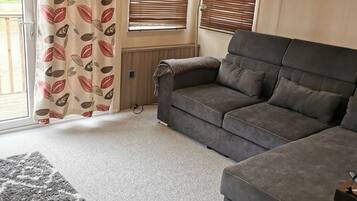 Cabin | Living area | TV, fireplace