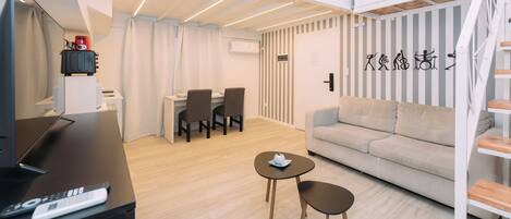 Comfort Apartment, Private Bathroom | Living area | Smart TV