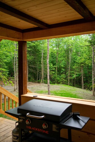 A private wooded retreat with modern amenities, close to town and pet friendly!