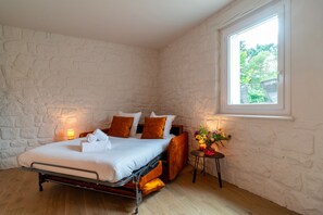 Een strijkplank/strijkijzer, gratis wifi, beddengoed