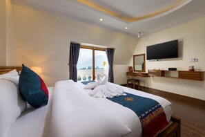 Premium bedding, down comforters, memory foam beds, desk