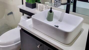 Shower, hair dryer, towels, soap