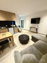 Superior Apartment, Balcony, City View | Living area | Flat-screen TV