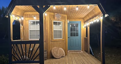 BEAUTIFUL lake front home with a private beach, dock and large yard