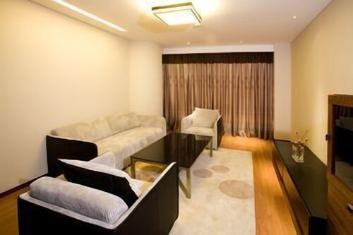 Dongfang Jinzuo Apartment Hotel