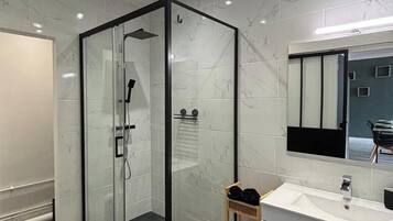 Shower, hair dryer, towels, soap