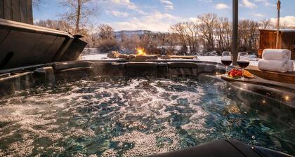 Experience Tranquility in a Premium Double Queen Room Overlooking the River and Stunning Mountain Vistas